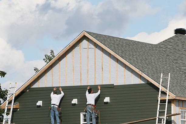Professional Siding technician working in Casstown, OH